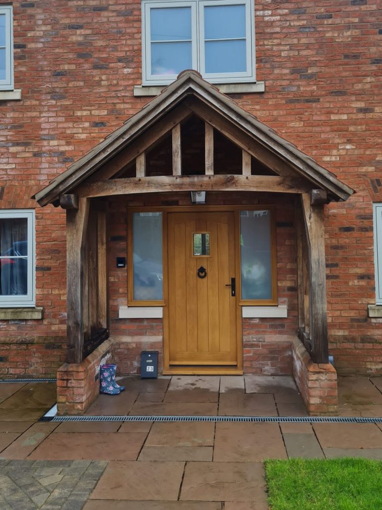 Green oak framed porch